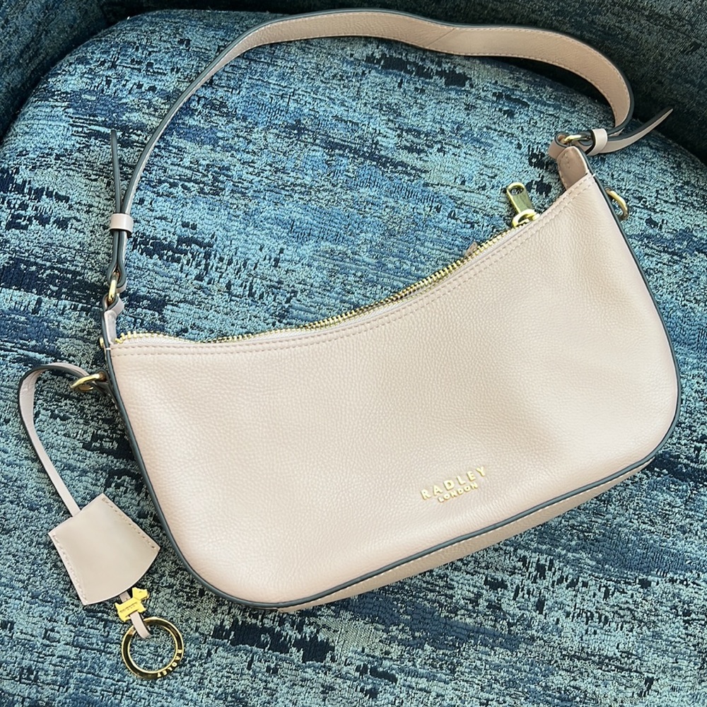 NWOT beautiful Radley bag in soft pebbled leather.